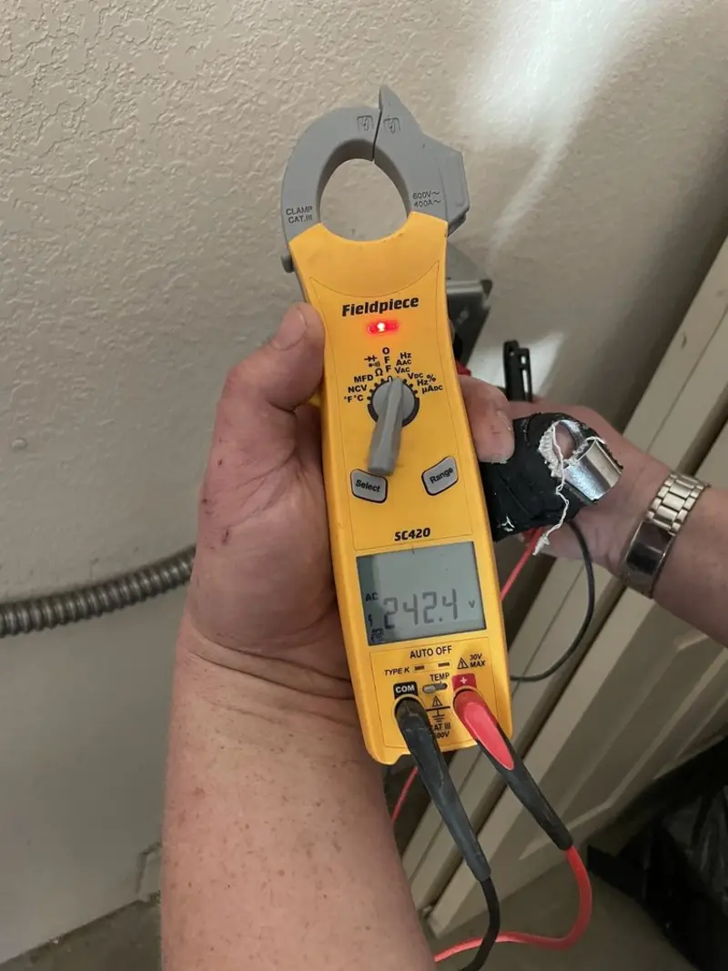 Voltage testing with clamp meter during Generator Installation in Garden Grove